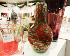 Glass pieces are among artwork on display in the galley.