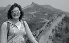 Kristin Klimeck poses at the Great Wall of China.