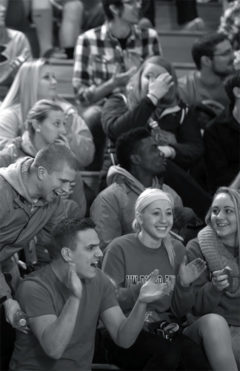 Part of the record breaking crowd cheers on the UWRF women's basketball team.