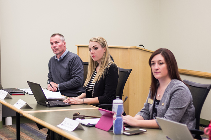 Assistant Chancellor for Student Affairs Gregg Heinselman (left), UWRF student body vice president Kaylee Kildahl and UWRF student body president Abby Wendt, listen during a Student Government Association meeting Nov. 14. Photo courtesy of Anja Gridley