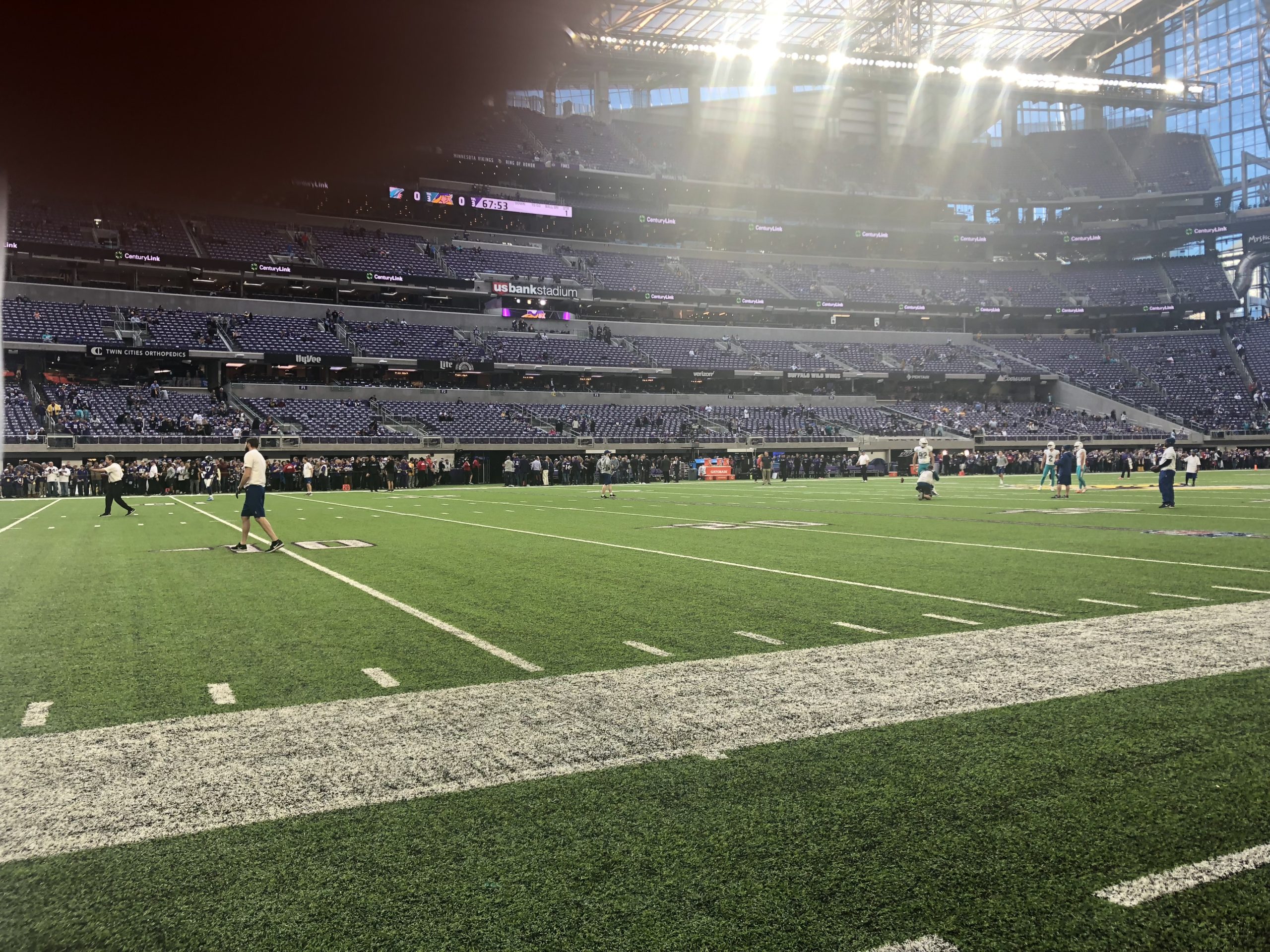 Dolphins players warming up an hour before kickoff at U.S. Bank Stadium.