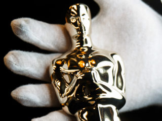 To give the Oscars their striking appearance, all surfaces have to be perfect. Gold plating is only one micron thick and would not cover even the smallest indent. To accomplish a perfect surface, the castings are plated first with copper, then nickel, and polished to a high luster.